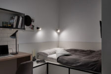 07 The platform bed has storage drawers inside and the platform also features a nightstand