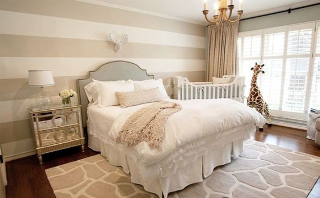 master bedroom with baby crib