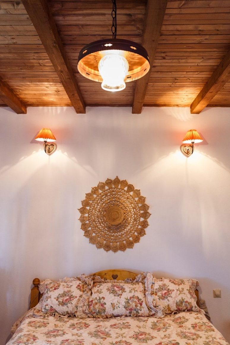 Look at this wooden bed with a carved heart, so cute