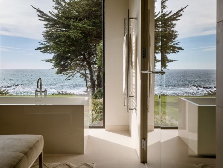 The bathroom features a luxurious rectangle bathtub and a glazed wall what can be better for haing a bath The bathroom features a luxurious rectangle bathtub and a glazed wall - what can be better for haing a bath