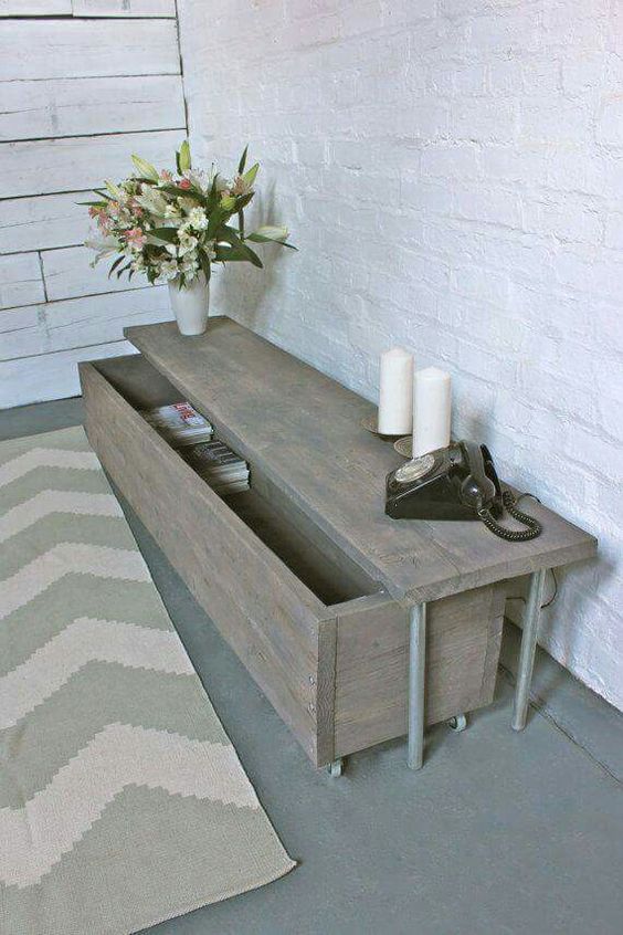 a bench of reclaimed wood with a wheel out drawer is a creative piece to make