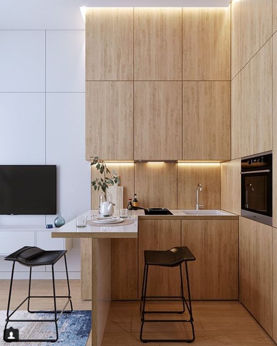 a tiny kitchen nook with some built-in lights here and there looks stylish and cool