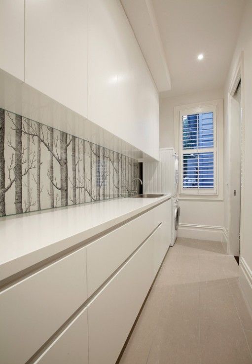 spruce up the minimalist kitchen with a botanical print wallpaper backsplash like this one