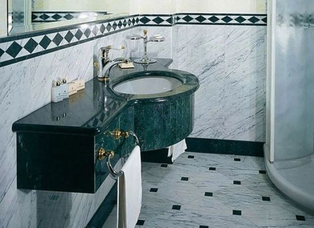 a stunning green marble sink with a drawer for a colorful statement and pure elegance