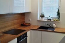 13 glossy white cabinets and rich-colored plywood backsplashes and a countertop for a cool modern look