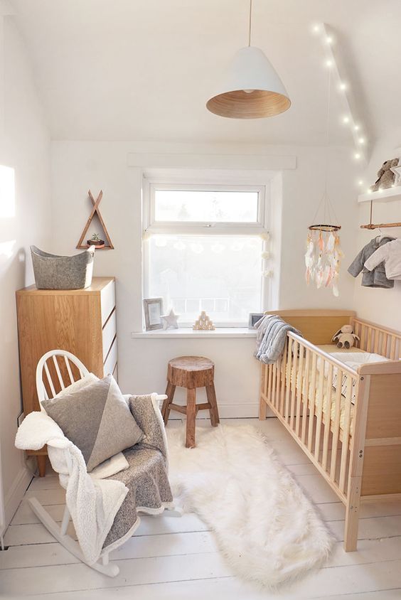 a pendant lamp and some lights over the bed compensate the small window