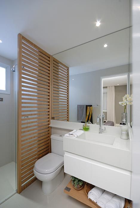 such a simple plywood space divider will not only bring some privacy but also add to the decor