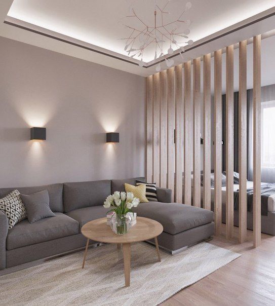 such a wood plank screen doesn't bring total privacy but it still separates the spaces making the bedroom more private