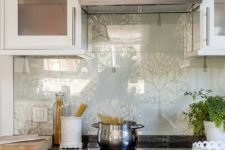 19 glass over the wallpaper backsplash will add a more modern feel to the kitchen