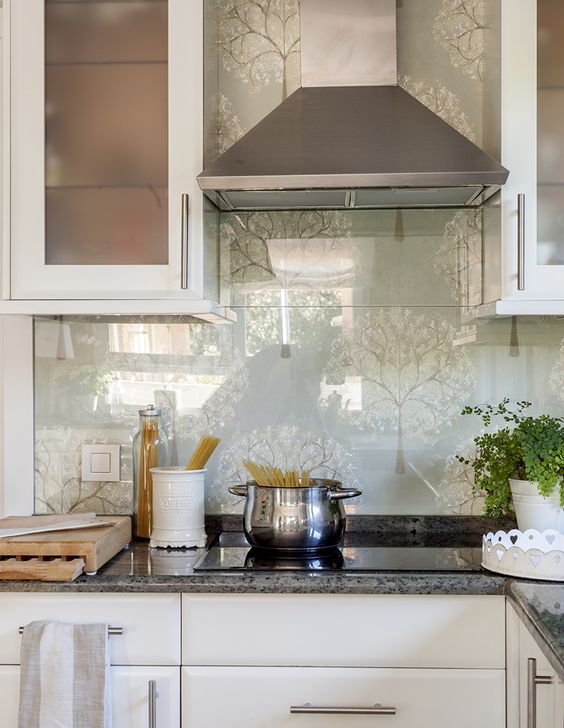 glass over the wallpaper backsplash will add a more modern feel to the kitchen