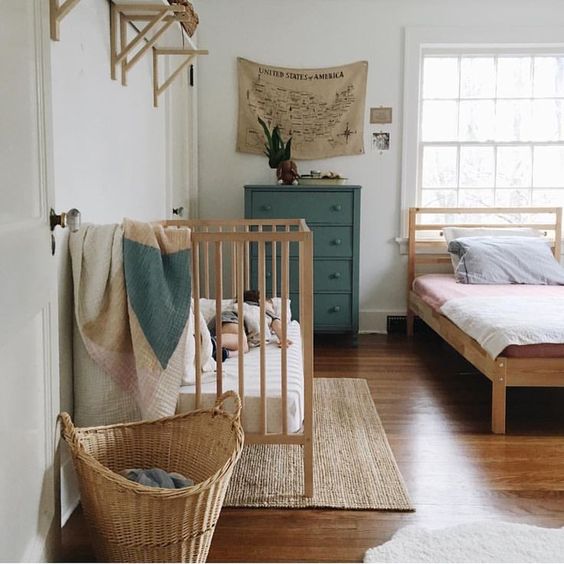 master bedroom with baby crib