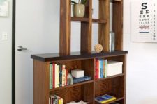 22 create an entryway if there’s none with a large wooden shelving unit with several box shelves