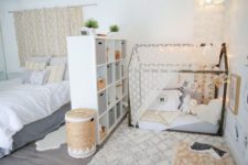 24 separate a nursery nook in your master bedroom with a comfy white shelving unit inserting some boxes for more privacy