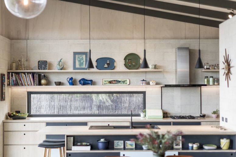 functional small kitchen design The kitchen is small yet very functional and practical, the colors are light but depth is given with graphite grey