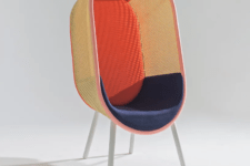 04 The red version features painted rattan and a navy seat and looks more mid-century like