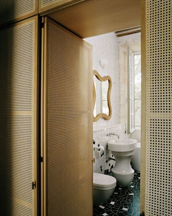 wood lattice doors can be a nice idea to separate an ensuite bathroom from a bedroom