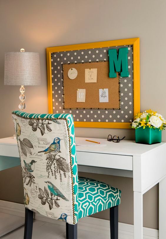 renovate an old chair with a bird print back and a geometric print front and give it a new and bold life