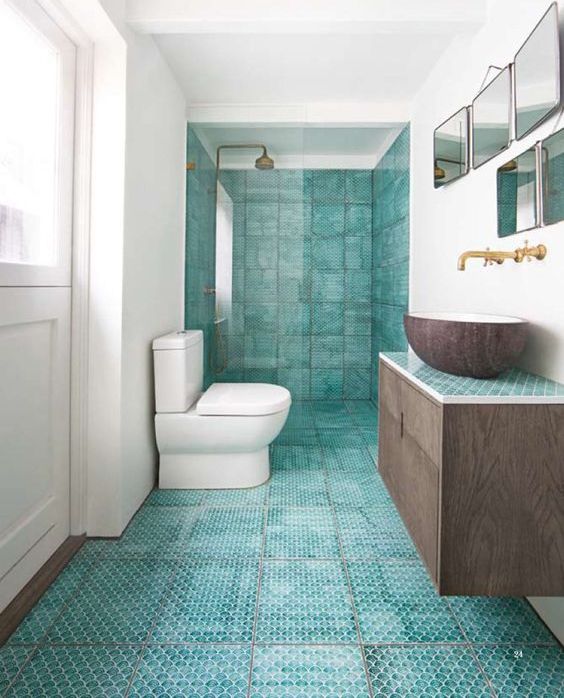 turquoise penny printed tiles contrast whites and brown natural wood and create a unique textural look