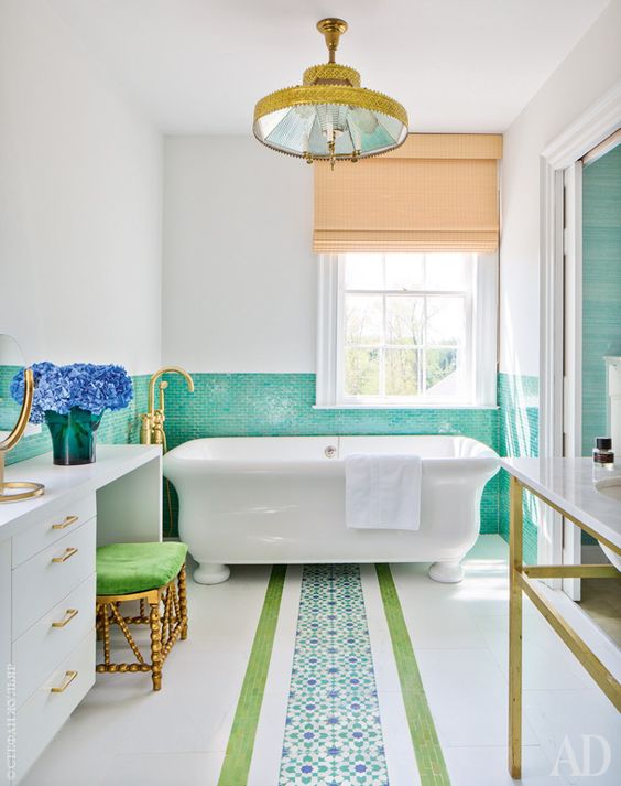 a vibrant turquoise tile backsplash brings a colorful touch and adds to the decor to make the space wow