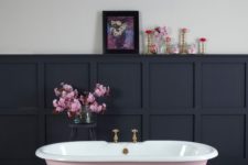 23 a vintage girlish bathroom with a pink clawfoot bathtub for a chic look