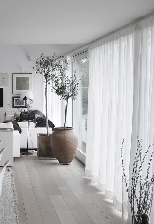 sheery light curtains brign some privacy yet make the space feel airy enough