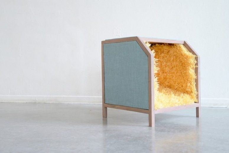 This creative chair is shaped as a box and it isn't a usual thing you are to sit on the top of it and your feet are meant to be inside This creative chair is shaped as a box and it isn't a usual thing you are to sit on the top of it and your feet are meant to be inside