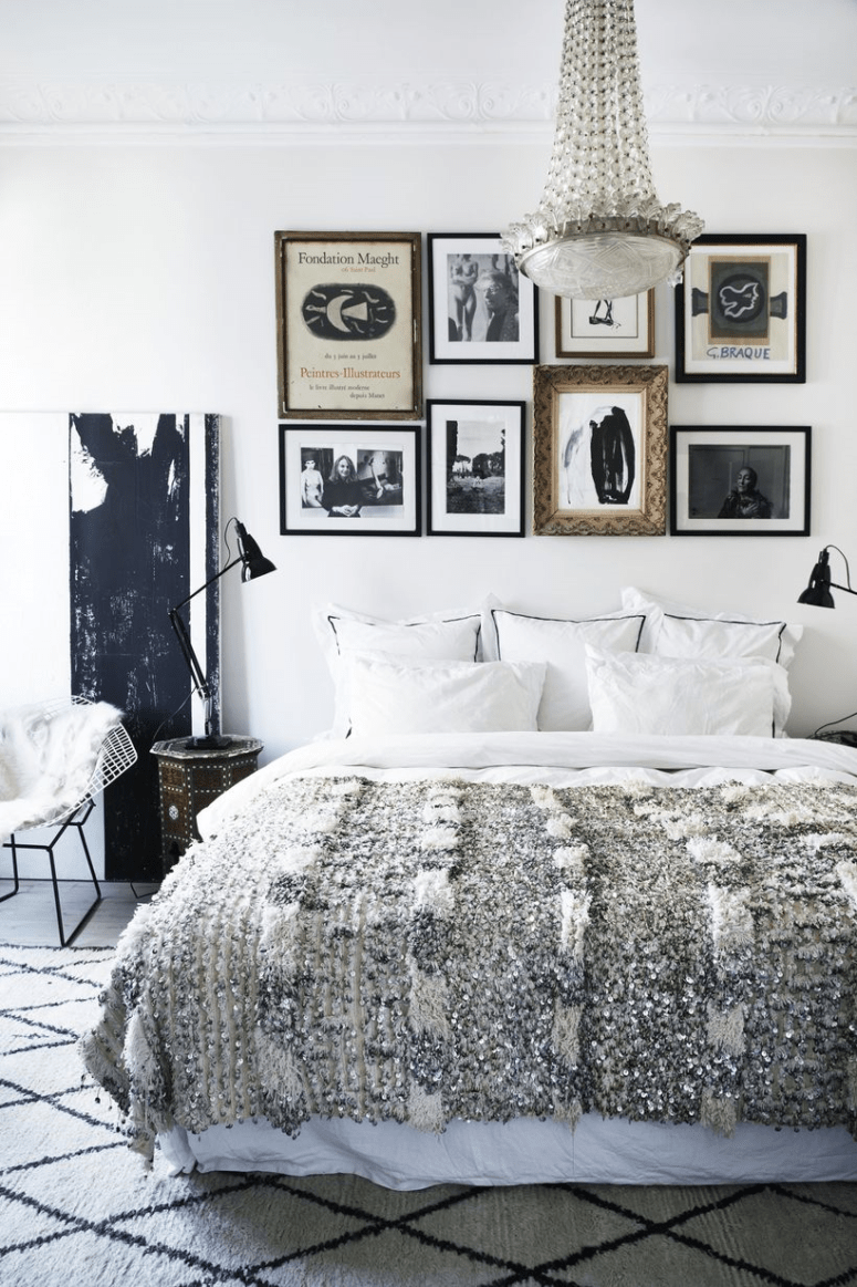 The bedroom is done with glam touches, art and Moroccan items