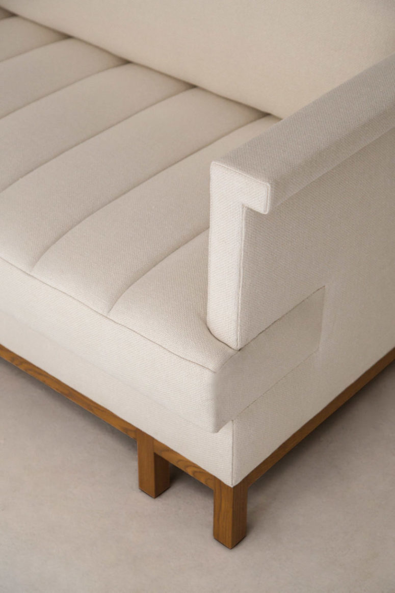 Unique armrests and legs make the sofa more interesting