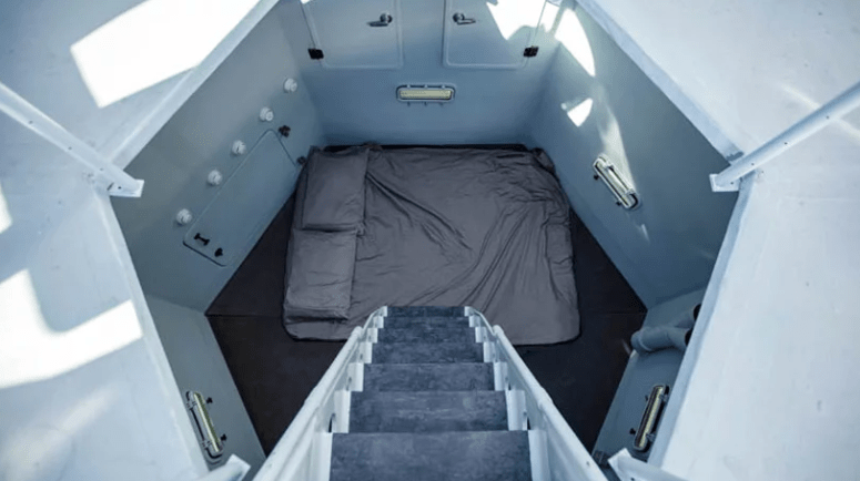 bedroom with wall lights There's also a sleeping space, which can be enough even for two, with wall lights and a sleeping space on the floor