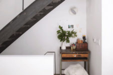 09 As there are two kids, there’s also a drawing nook with a vintage desk and a stool