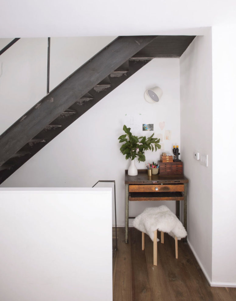 As there are two kids, there's also a drawing nook with a vintage desk and a stool