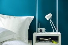 14 a hanging modern bedside table of a box features open storage and a laconic look