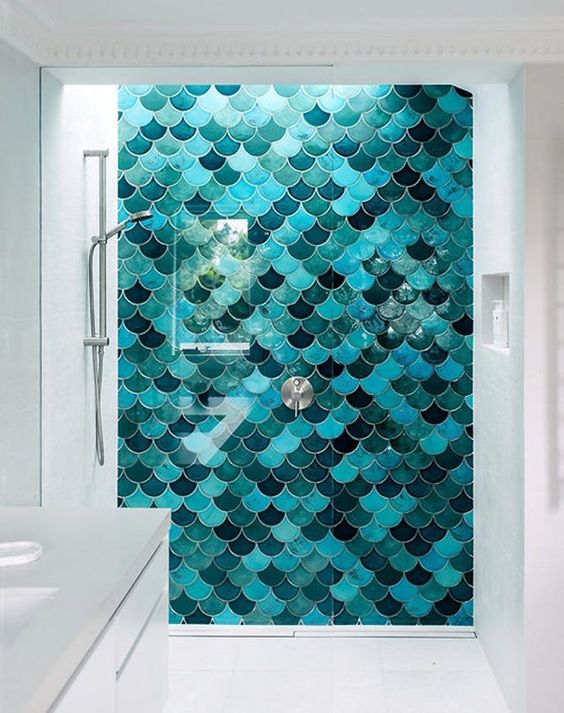 mermaid-inspired tiles in the shower will remind you of the sea and swimming in it