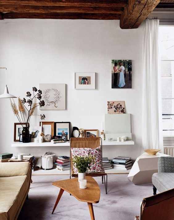 white plaster and a dark wooden ceiling are a perfect palette for creating a cool interior