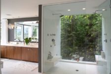 22 a full height window goes on a jungle-style private garden, which guarantees privacy
