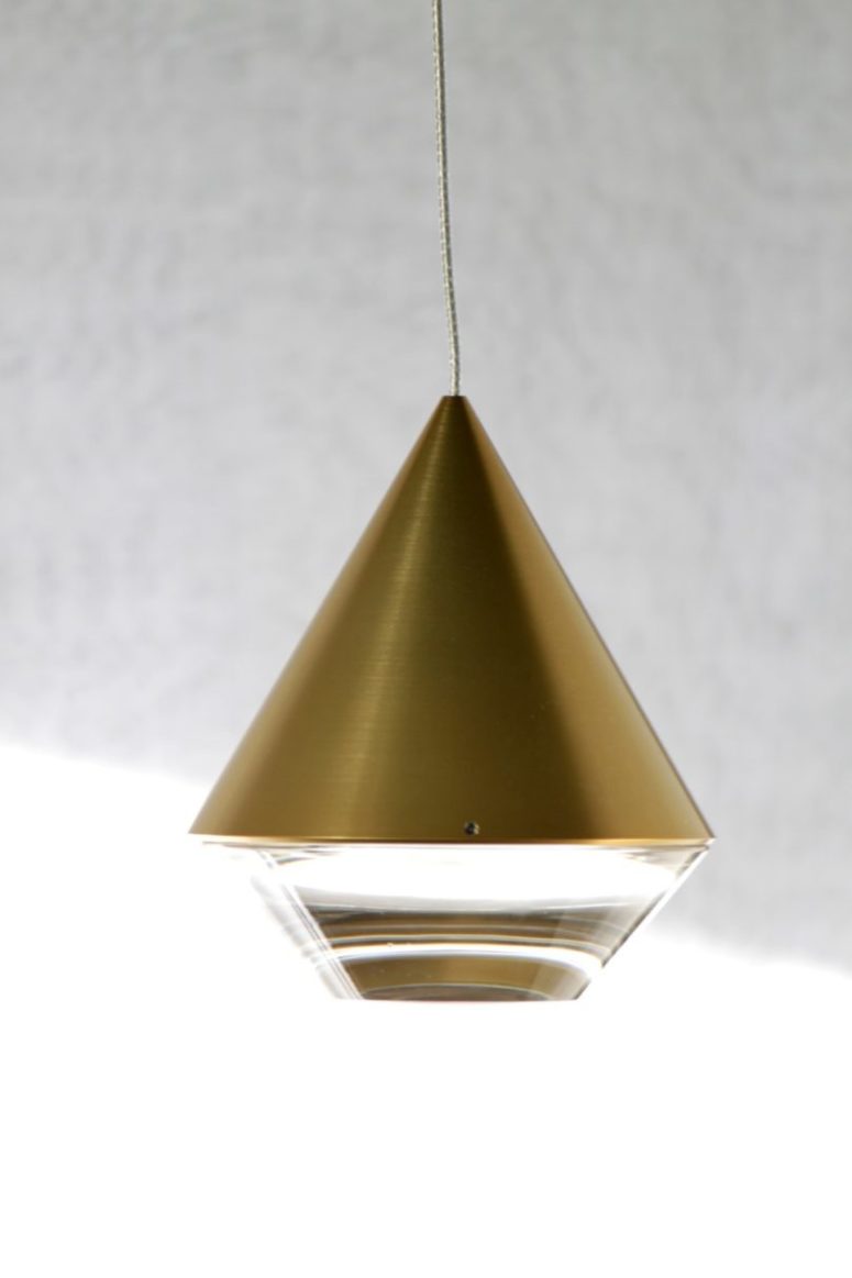 pendant lamp This is Alto, a lamp, the shape of which is inspired by a cut diamon, its lower part is transparent