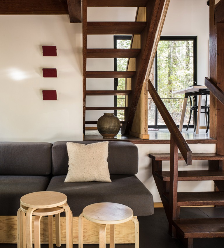 Much wood and chic mid century modern furniture were added to the interiors but they are kept modest to nod at the original decor Much wood and chic mid-century modern furniture were added to the interiors but they are kept modest to nod at the original decor