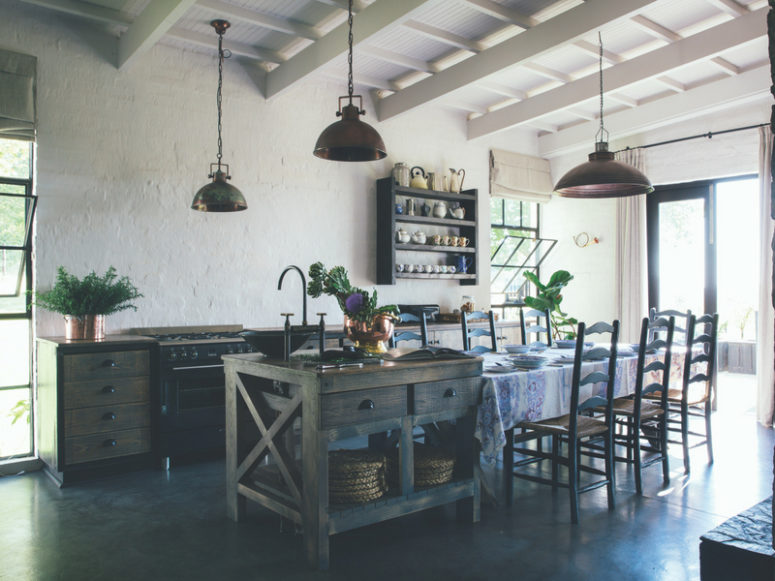 rustic barn kitchen design The kitchen is done only with some separate cabinets, a rustic kitchen island and an eat-in area