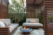 03 rich-stained wooden fences cover the whole outdoor zone and give it an ultra-modern look
