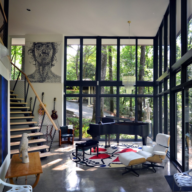 The home features stylish furniture picks and bright artworks and textiles, which is characteristic for modern decor style The home features stylish furniture picks and bright artworks and textiles, which is characteristic for modern decor style