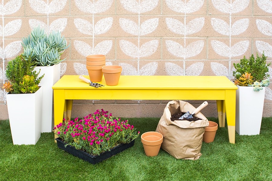 a colorful outdoor bench can be made of an IKEA Nornas bench and some bold paint of your choice