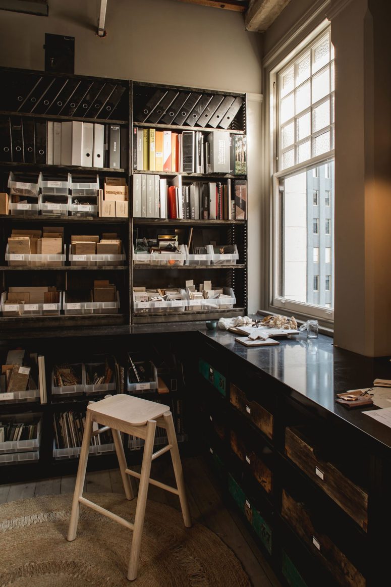 library combined with an office nook Libraries and working spaces are combined with living areas