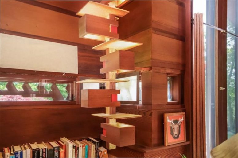 The design of the house contains signature Wright's elements in eahc point including these lit up shelves The design of the house contains signature Wright's elements in eahc point including these lit up shelves