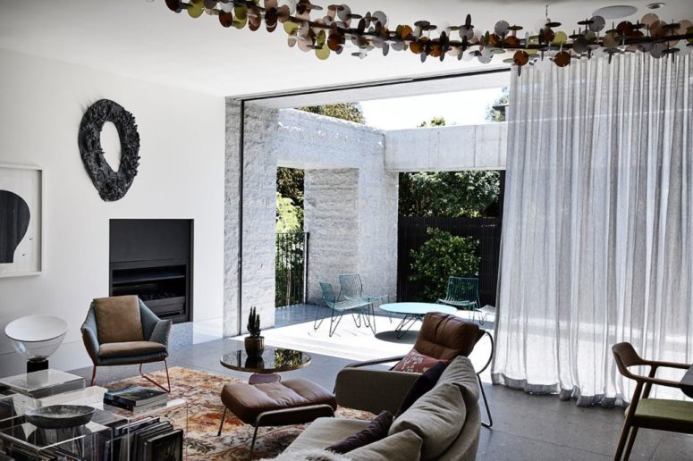 The inner living room is extended outdoors to fill it with light and fresh air, and there's a curtain to keep the sun away if needed The inner living room is extended outdoors to fill it with light and fresh air, and there's a curtain to keep the sun away if needed