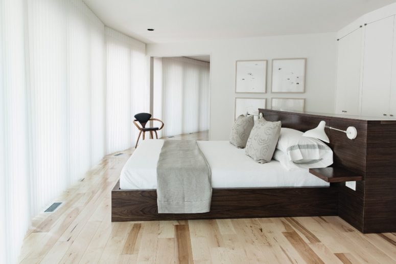 curtains can create a sense of privacy The master bedroom is a serene space done in neutrals, the glazed wall can be covered with curtains for privacy