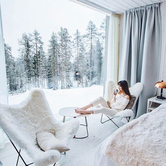 any room looks more welcoming with a giant amount of natural light that a floor to ceiling window gives