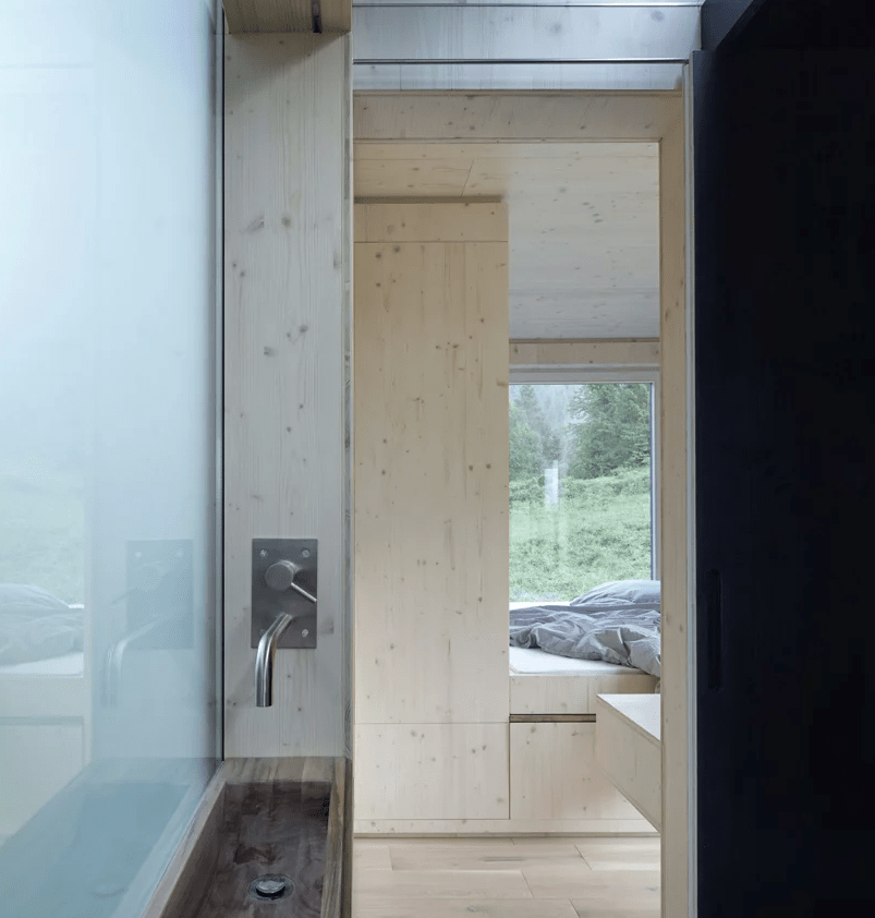 bathroom with wood clad walls