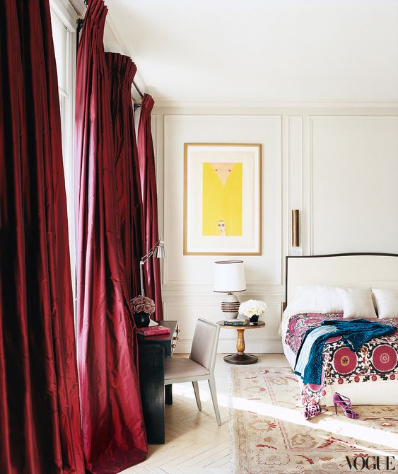 you may add a chic feel to the space with burgundy curtains, which is a simple way to add color