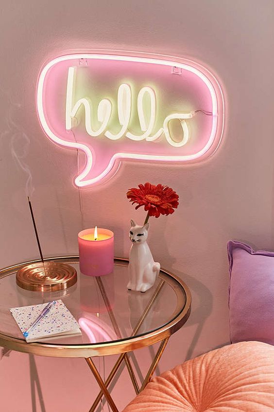 spruce up your girlish bedroom with a neon light instead of a usual sconce and give it a unique look