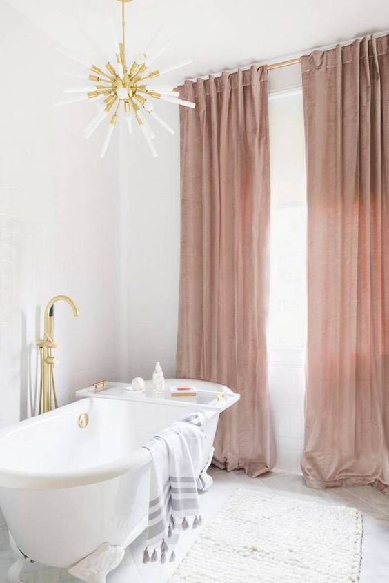 add dusty rose drapes to your bathroom for a refined and girlish feel